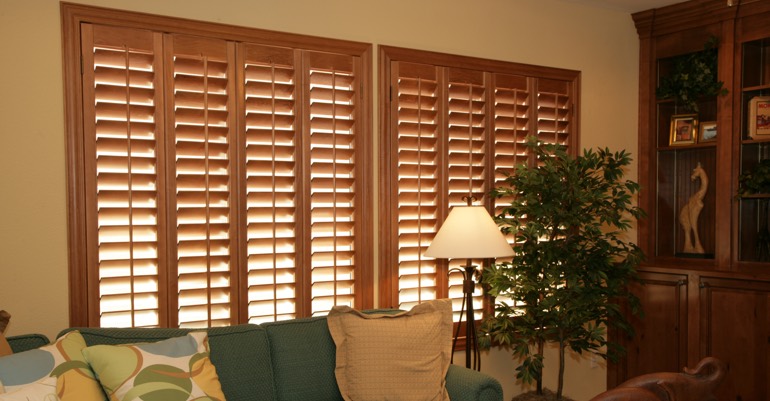 Wood shutters in New Brunswick living room.